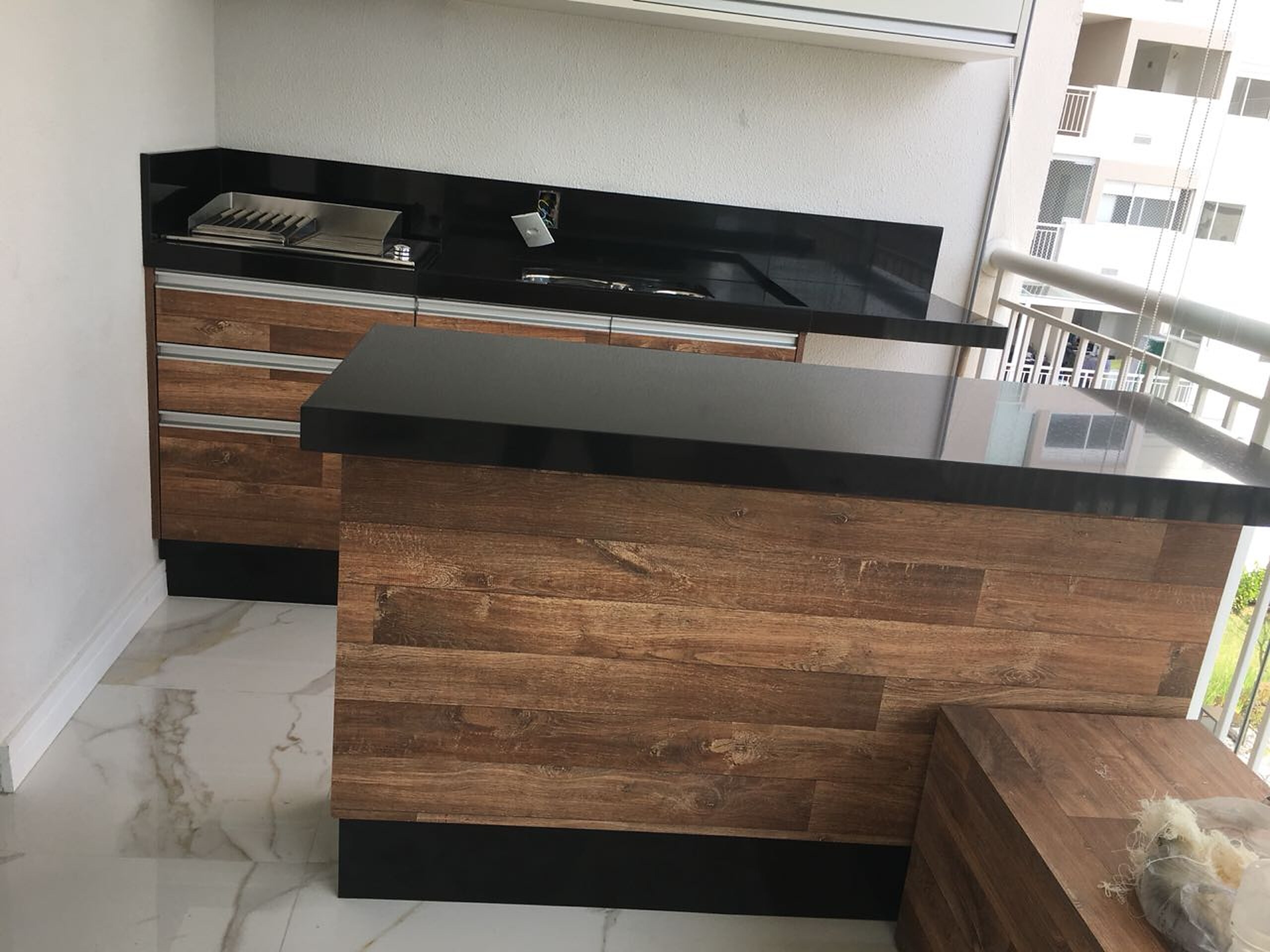 espaco gourmet com acabamento em pedra